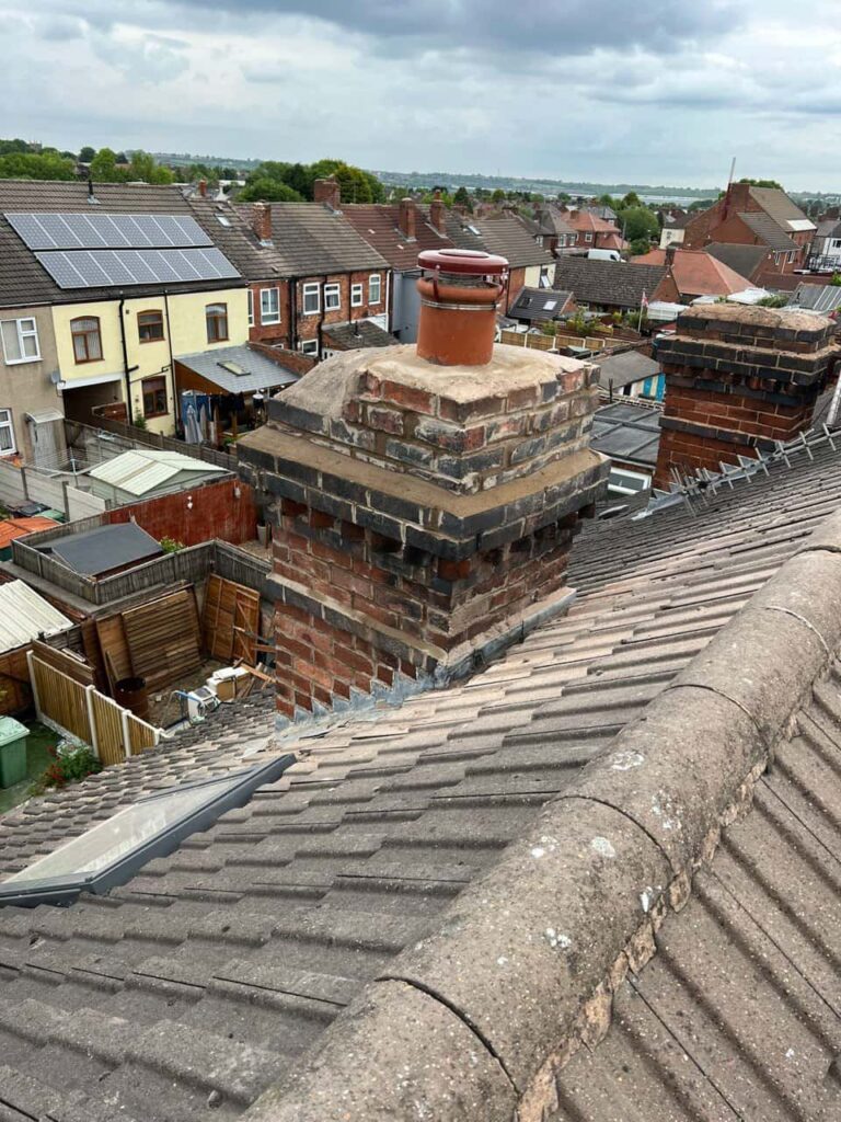 This is a photo taken from a roof which is being repaired by Haverhill Roofing Repairs, it shows a street of houses, and their roofs